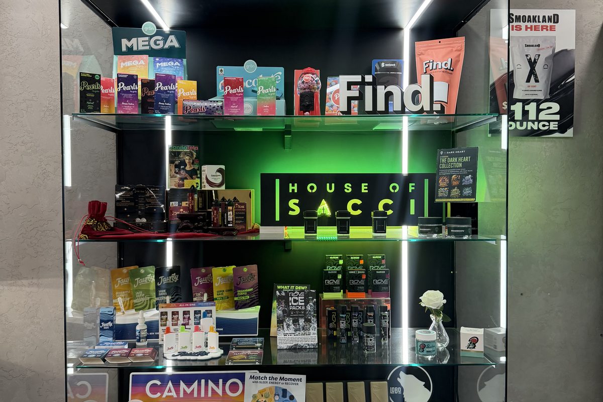 Cannabis edibles display featuring Camino gummies at QCD