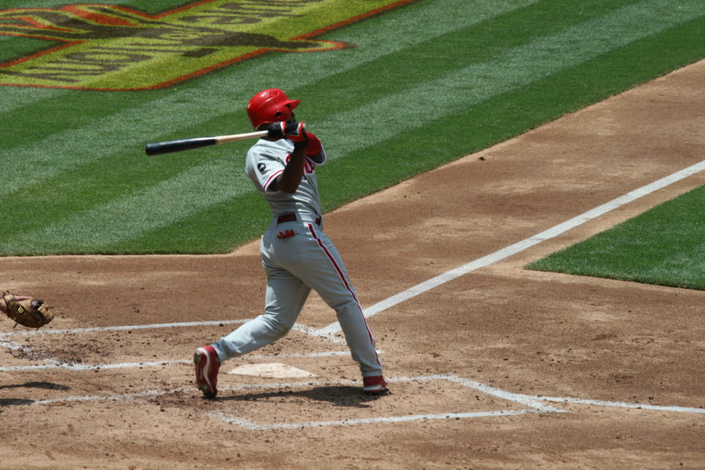 A baseball player swinging a bat